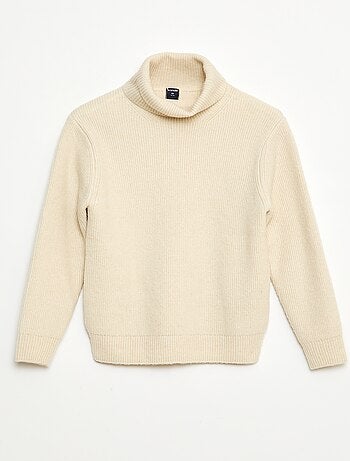 Maglione a coste tinta unita con collo alto