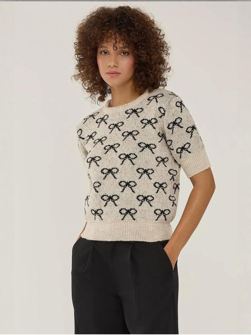 Maglione a maniche corte con motivo a fiocco hiccup Multicolore - Kiabi