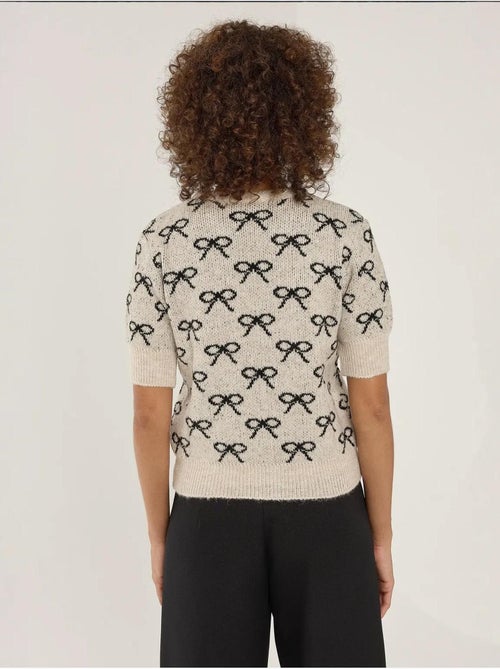 Maglione a maniche corte con motivo a fiocco - Kiabi Maglione a maniche corte con motivo a fiocco - Kiabi