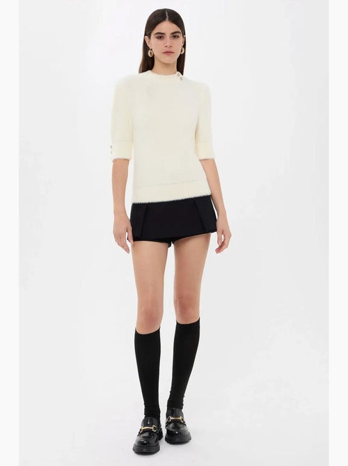 Maglione a maniche corte decorato con pietre hiccup - Kiabi Maglione a maniche corte decorato con pietre hiccup - Kiabi