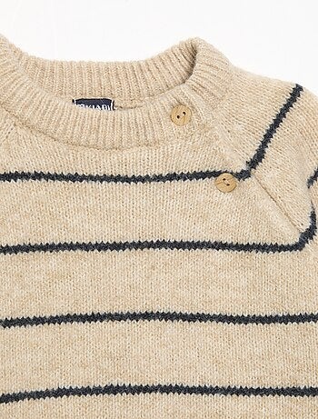 Maglione a righe con apertura abbottonata sul collo