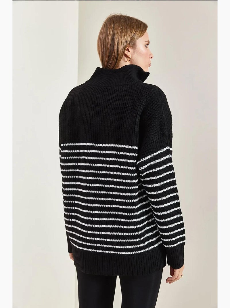 Maglione a righe con collo alto e cerniera lucci Nero Bianco - Kiabi