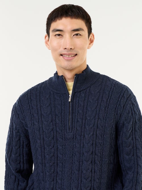 Maglione a trecce con collo alto e zip - Kiabi Maglione a trecce con collo alto e zip - Kiabi