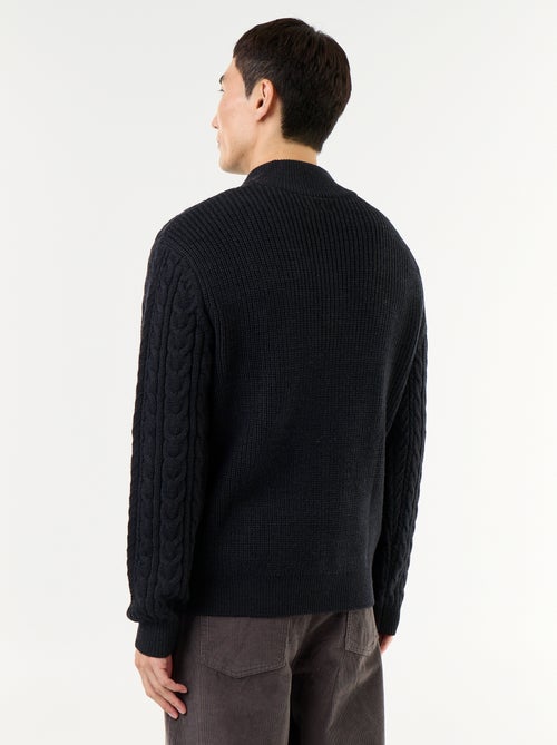 Maglione a trecce con collo alto e zip - Kiabi Maglione a trecce con collo alto e zip - Kiabi