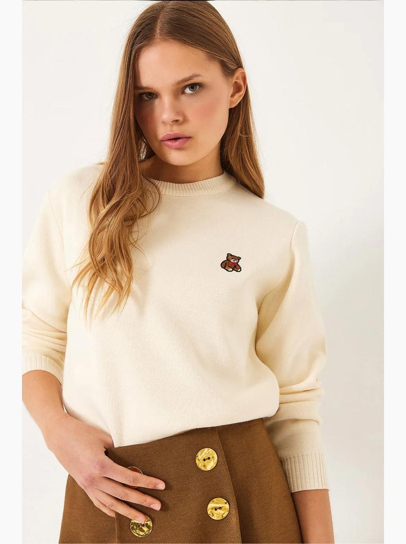 Maglione basic ricamato teddy lucci Crema - Kiabi