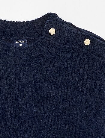 Maglione con apertura magnetica sulla spalla