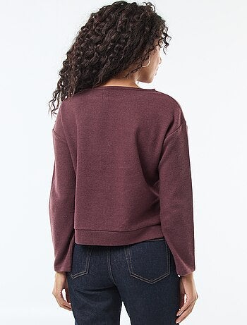 Maglia con bottoni decorativi dorati sulla spalla