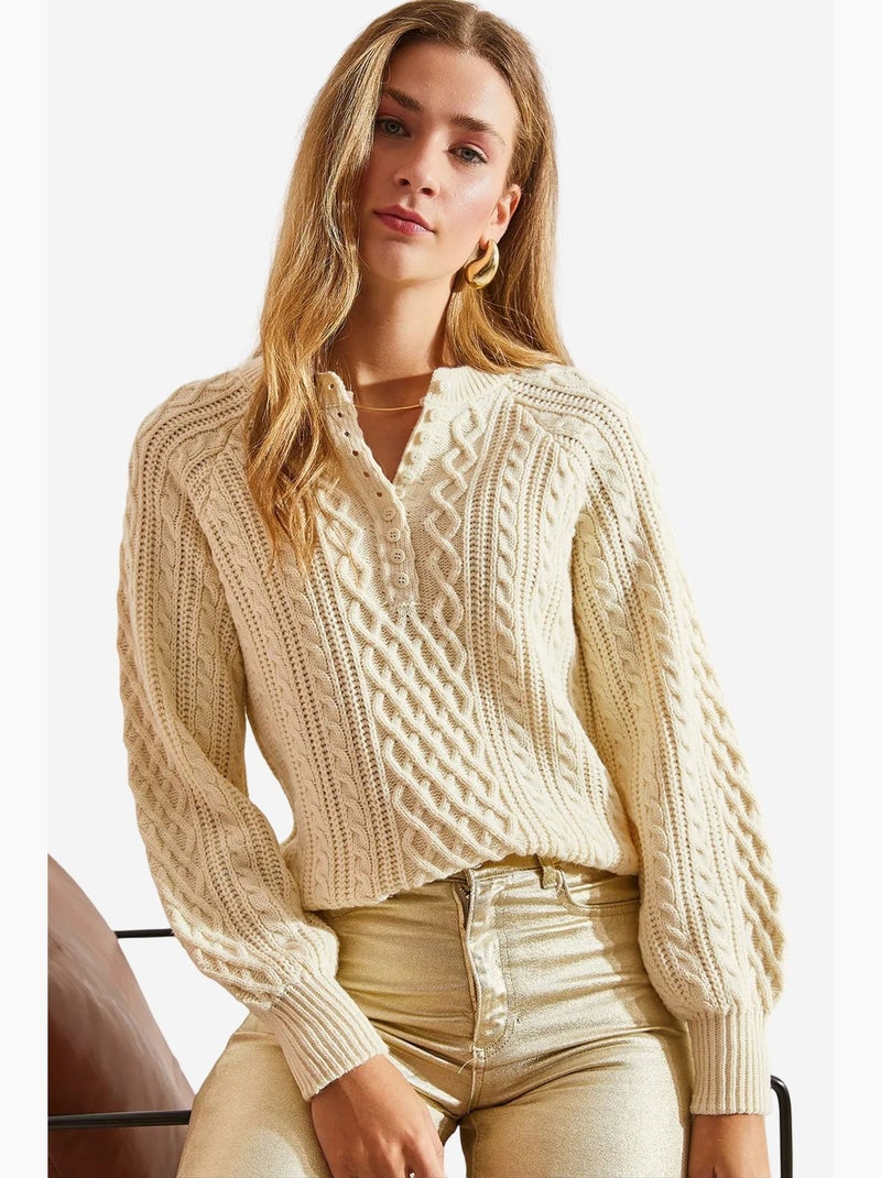 Maglione con bottoni in maglia a trecce lucci Crema - Kiabi