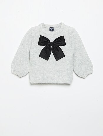 Maglione con grande fiocco fantasia