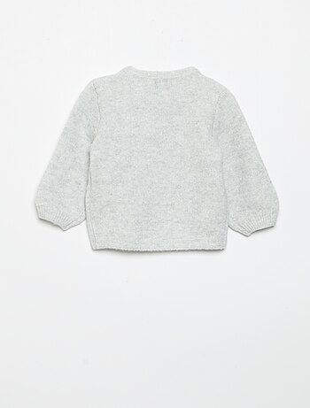 Maglione con grande fiocco fantasia