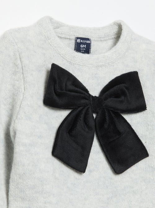 Maglione con grande fiocco fantasia - Kiabi
