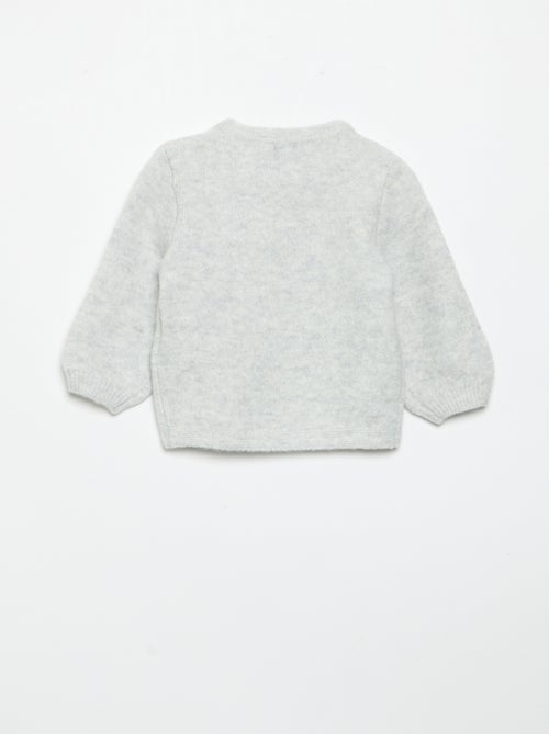 Maglione con grande fiocco fantasia - Kiabi