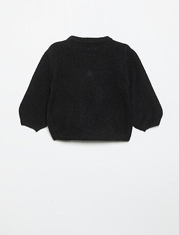 Maglione con grande fiocco fantasia