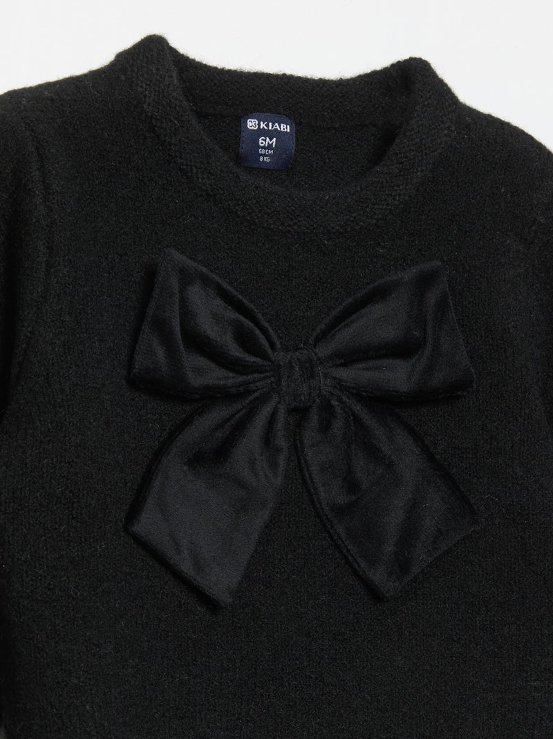Maglione con grande fiocco fantasia Nero - Kiabi