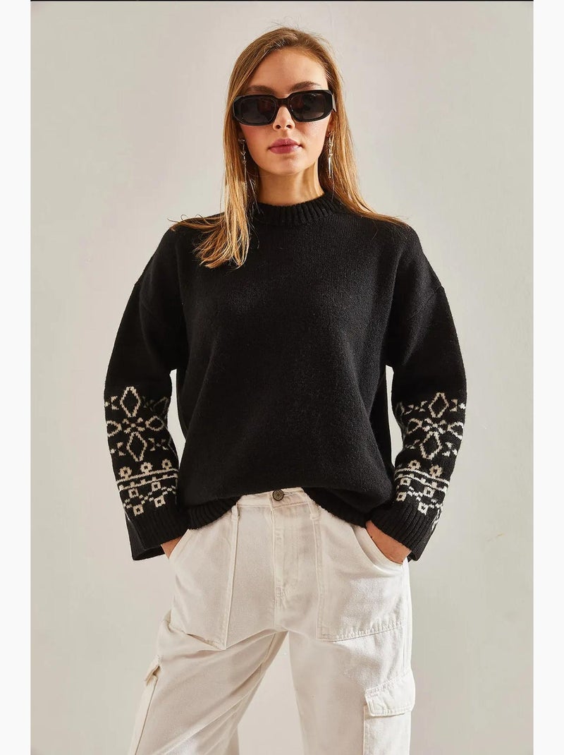 Maglione con maniche a fantasia lucci Nero Bianco - Kiabi