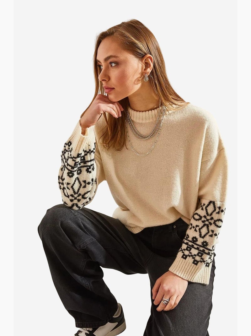 Maglione con maniche a fantasia lucci Nero - Kiabi