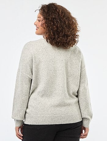 Maglione con scollo a cuore incrociato e strass decorativi
