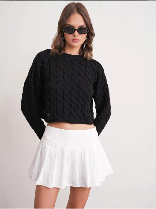 Maglione girocollo con motivo a trecce mixray - Kiabi Maglione girocollo con motivo a trecce mixray - Kiabi