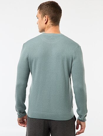 Maglione girocollo goffrato tinta unita