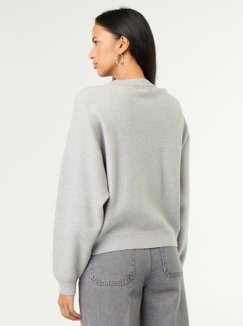 Maglione girocollo in maglia morbida con scritta - Kiabi Maglione girocollo in maglia morbida con scritta - Kiabi