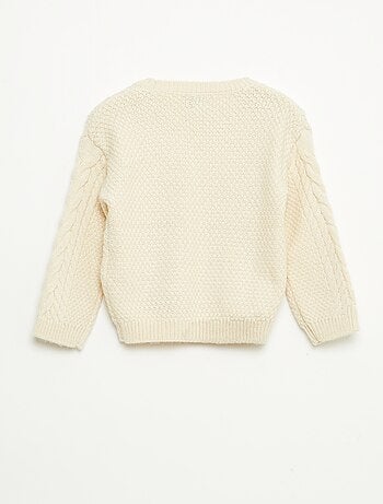 Maglione in maglia a trecce