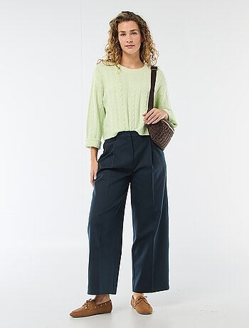 Maglione in maglia a trecce