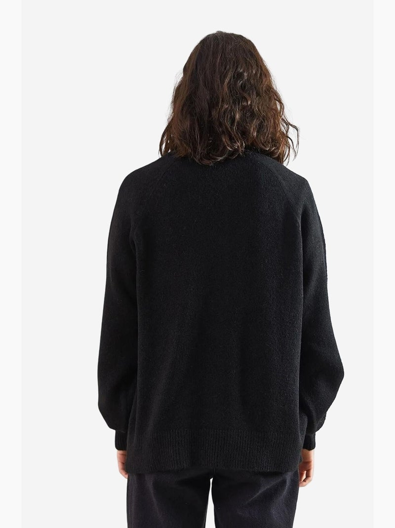 Maglione in maglia con colletto a bottoni lucci Nero - Kiabi