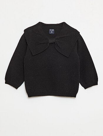 Maglione in maglia con un ampio fiocco decorativo sul davanti