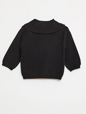 Maglione in maglia con un ampio fiocco decorativo sul davanti