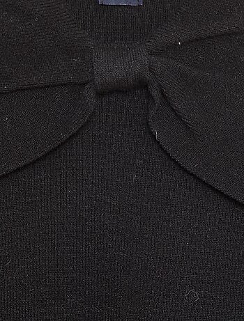 Maglione in maglia con un ampio fiocco decorativo sul davanti