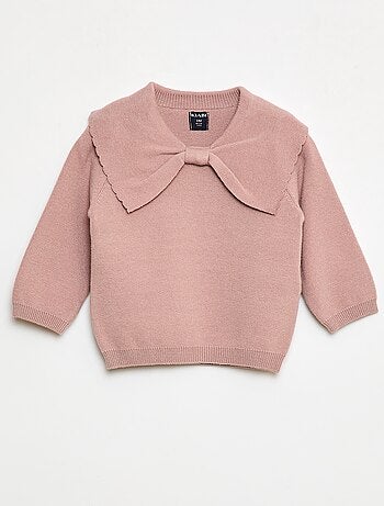 Maglione in maglia con un ampio fiocco decorativo sul davanti