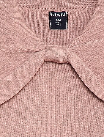 Maglione in maglia con un ampio fiocco decorativo sul davanti