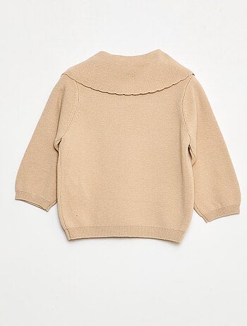 Maglione in maglia con un ampio fiocco decorativo sul davanti