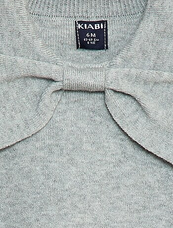 Maglione in maglia con un ampio fiocco decorativo sul davanti