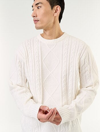 Maglione in maglia grossa con trecce