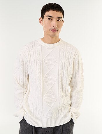 Maglione in maglia grossa con trecce