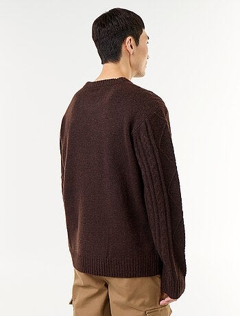 Maglione in maglia grossa con trecce