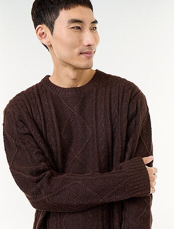 Maglione in maglia grossa con trecce