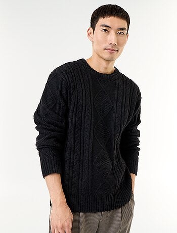 Maglione in maglia grossa con trecce