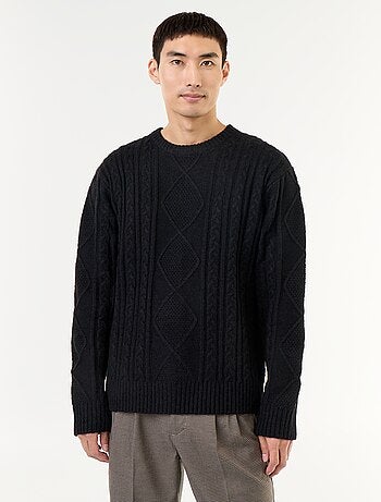 Maglione in maglia grossa con trecce