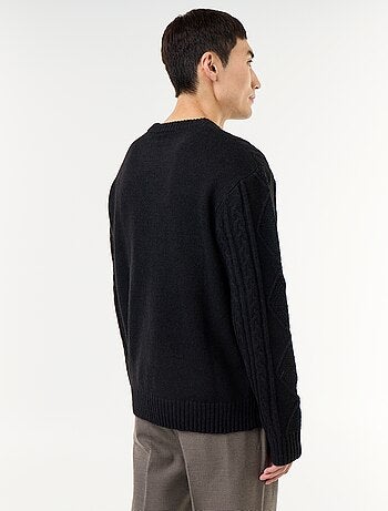 Maglione in maglia grossa con trecce