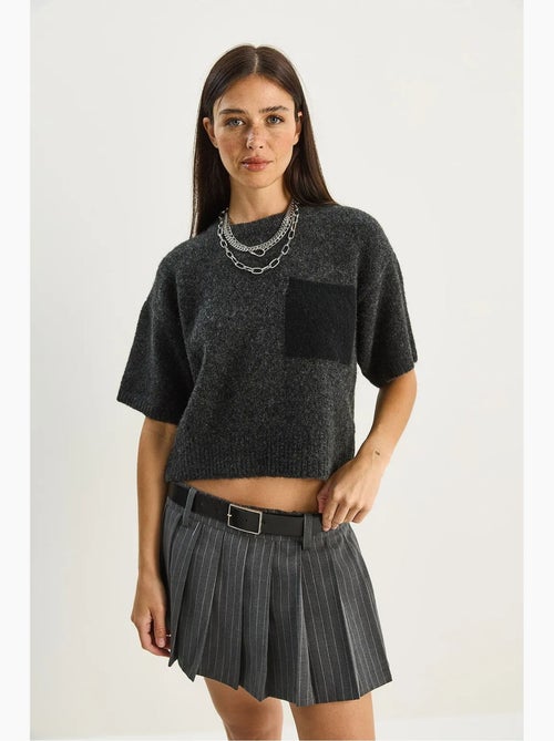 Maglione in maglia oversize con girocollo e tasca lucci - Kiabi Maglione in maglia oversize con girocollo e tasca lucci - Kiabi