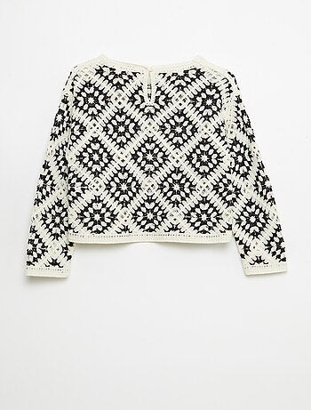 Maglione in maglia traforata con ricami floreali