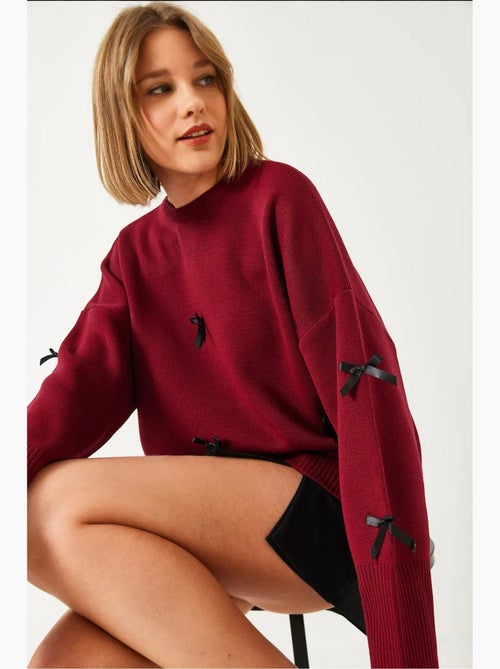 Maglione lavorato a maglia con dettaglio fiocco lucci - Kiabi