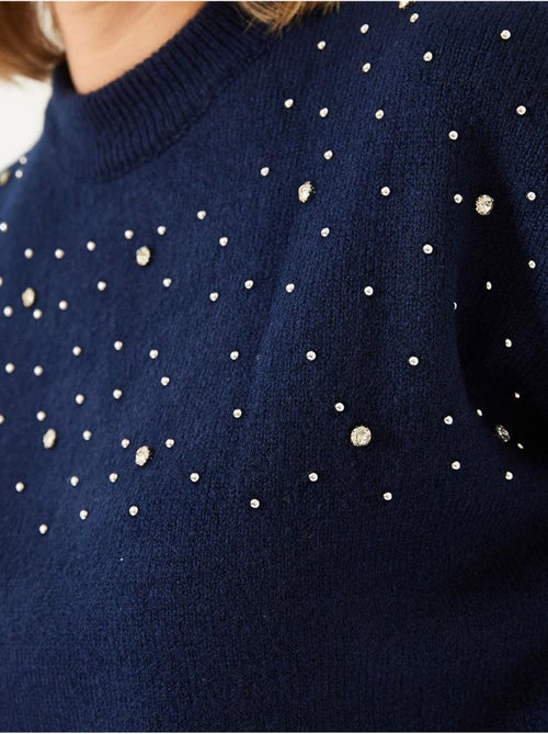Maglione lavorato a maglia con pietre decorate lucci - Kiabi Maglione lavorato a maglia con pietre decorate lucci - Kiabi