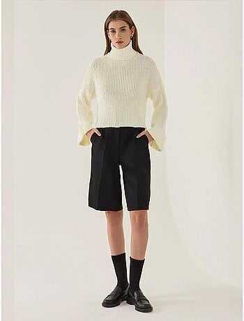 Maglione oversize a collo alto