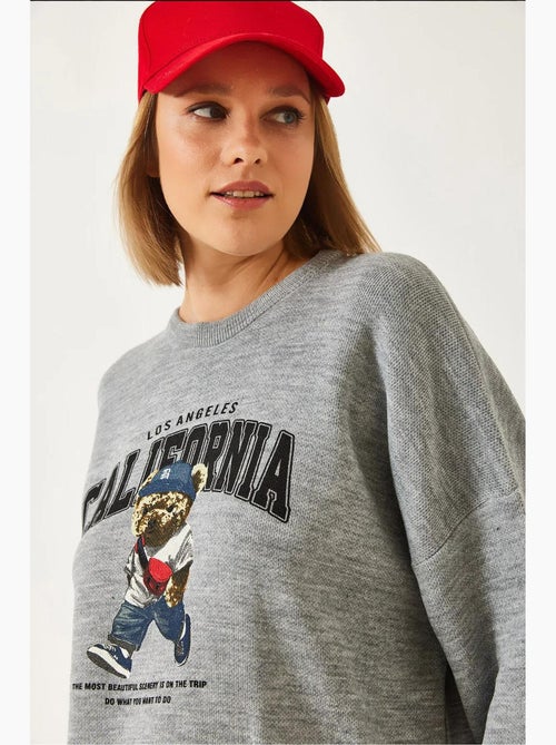Maglione oversize in maglia con stampa orso e scollo rotondo lucci - Kiabi