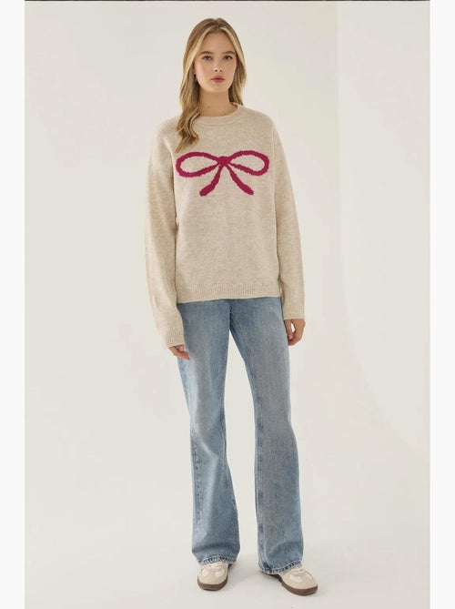 Maglione relaxed fit con dettaglio fiocco hiccup - Kiabi Maglione relaxed fit con dettaglio fiocco hiccup - Kiabi