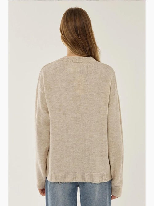 Maglione relaxed fit con dettaglio fiocco hiccup - Kiabi Maglione relaxed fit con dettaglio fiocco hiccup - Kiabi