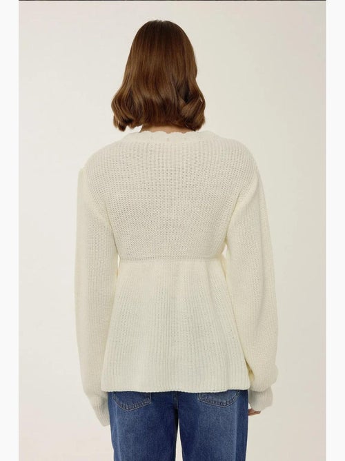 Maglione sliced con scollo a v e dettaglio annodato hiccup - Kiabi Maglione sliced con scollo a v e dettaglio annodato hiccup - Kiabi